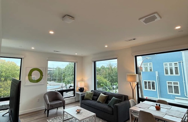 Luxury 1BR w/Rooftop 5 min to Logan Airport Free EV Garage Parking