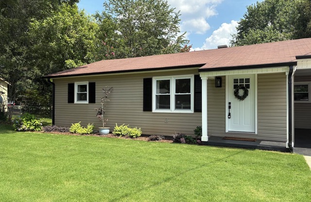 Modern 3-bedroom house near downtown Forest City with a private backyard.