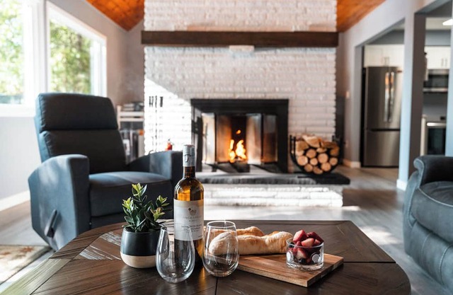Cedar and Sand Lakehouse on Lake Kashagawigamog | Fireplace | Firetable | Dock