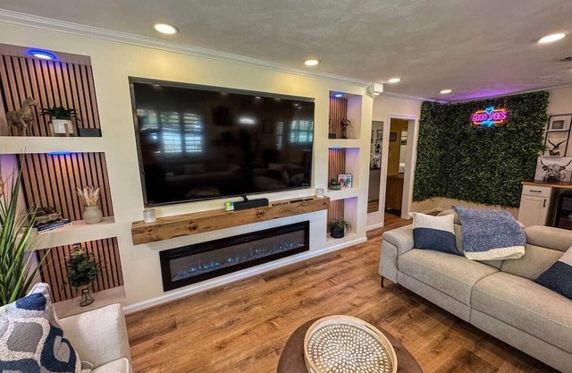 WELCOME TO THE VIBE- NEWLY LISTED! 3BR -Modern Brick home- 10 acres with 85in TV
