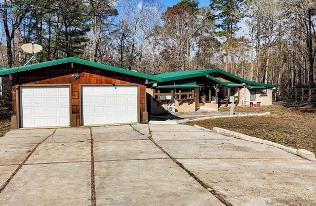 The lovely 3-bedroom lake house in Brookeland is near all amenities.