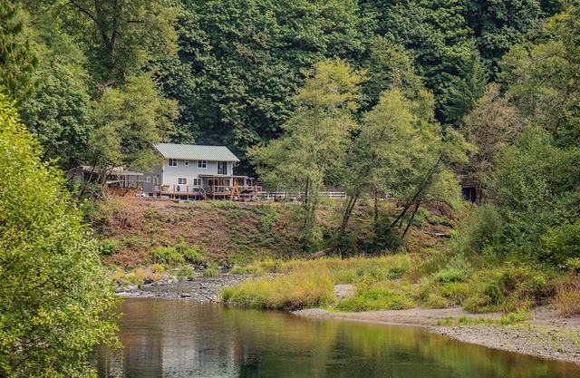 Updated Riverfront Home with Stunning Views, Deck, Kayaks, Fireplace
