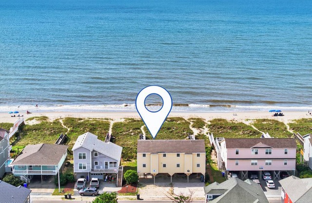 Just A Touch in Ocean Isle Beach, a spacious 6-bedroom retreat perfect for up to 16 guests.