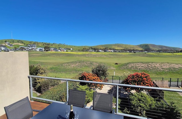 19th Hole - Tee off & unwind in style at Lady Bay