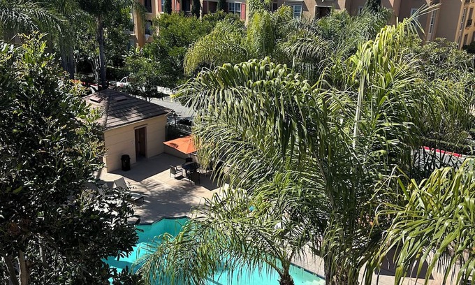 Airport Area Apartment | comfortable bedroom with blackout curtains for sound sleep