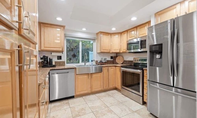 Lake Forest Condo | A Spacious room with artistic design and a bidet in the forest.