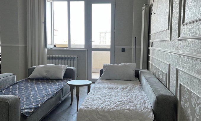 Nasimi Apartment | CHEE LUXEnCharming Urban Oasis: Your Perfect Home Away from Home