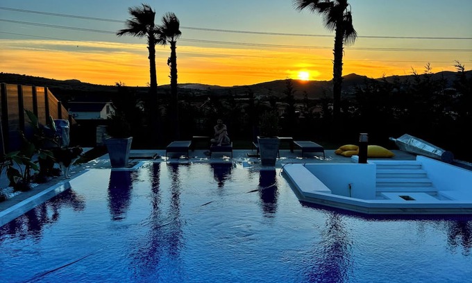Foca Villa | Sunken seated fire pit Villa with 4 bedroom