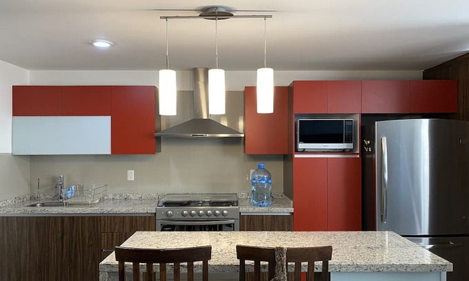 Carmen Apartment | Habitación con Baño Privado y Estacionamiento
