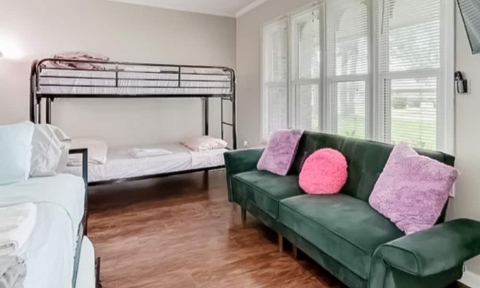Northside House | Quiet home on a spacious lot with screened porch & game room