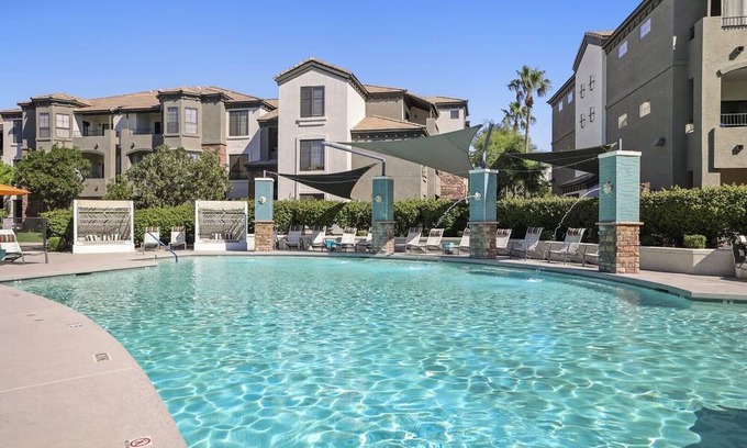 Glendale Sports and Entertainment District Apartment | CozySuites Glendale walk to stadium w/ pool & gym!