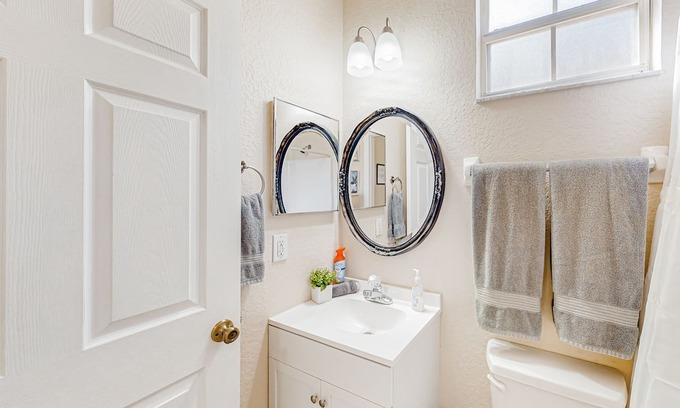 Haines City House | Townhouse near the lake with outdoor pool, hot tub, patio, streaming, W/D, & AC