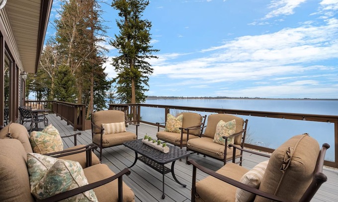Sandpoint House | Waterfront home with private dock, beach, hot tub & wrap-around deck