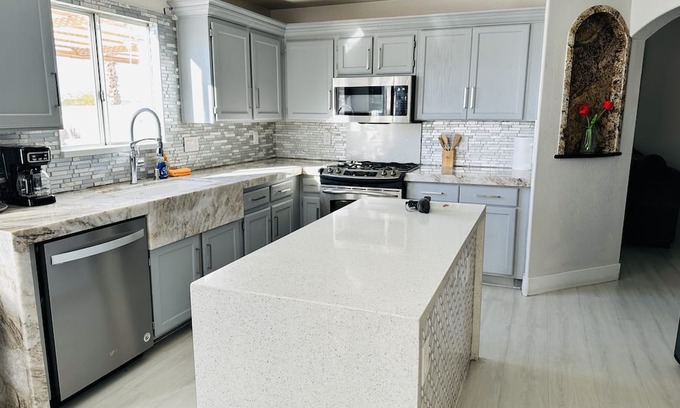 Sunrise Manor House | Enjoy the view of the entire city while playing mini golf in the patio.