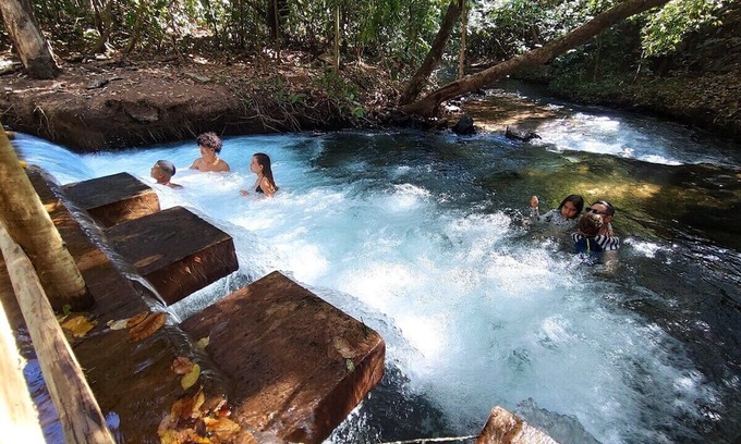 Pousada do Rio Quente Apartment | Resort Park Veredas with the warm river in the background