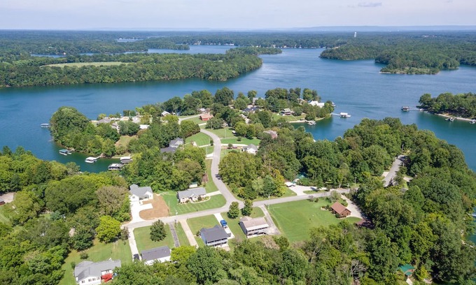 Winchester House | Lakefront home, Private Dock, Sleep 18, Hot Tub Cozy Cove just steps to the lake