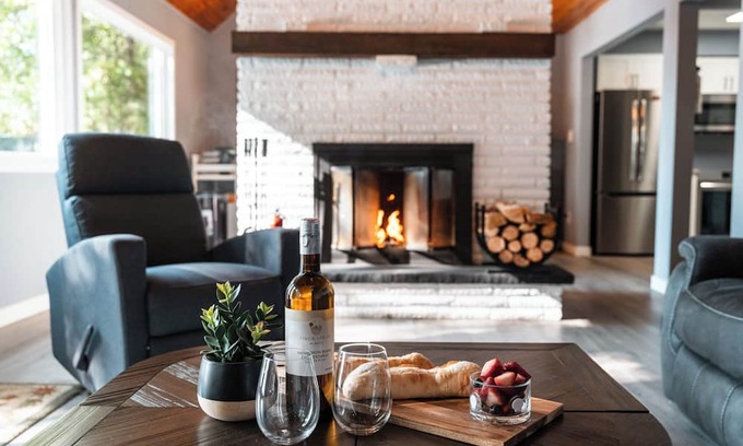 Minden Hills Cottage | Cedar and Sand Lakehouse on Lake Kashagawigamog | Fireplace | Firetable | Dock