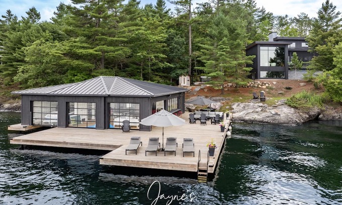 Muskoka Lakes Cottage | Outstanding 5 bed 6 bath cottage on Lake Joseph with Tennis Studio