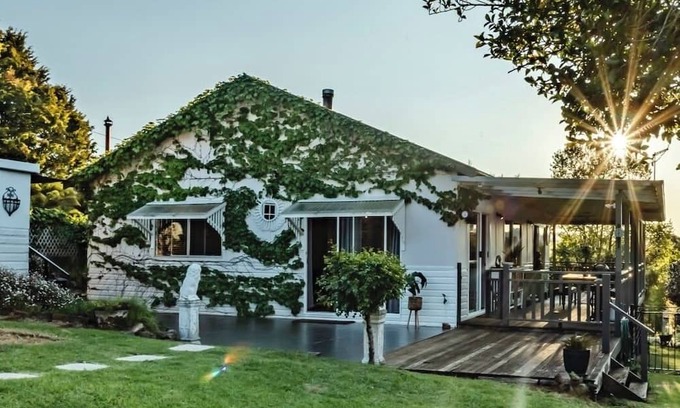 Dorrigo Cottage | Charming 1940's two bedroom cottage, established gardens, large verandah and BBQ