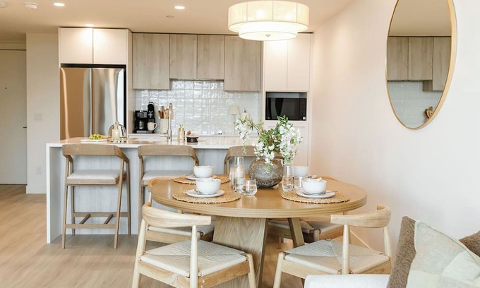 South Pandosy Condo | Enjoy lakefront living at its finest in this stylish condo! Relax by the pool, soak in the stunning water views, and unwind in comfort—just steps from the shoreline.
