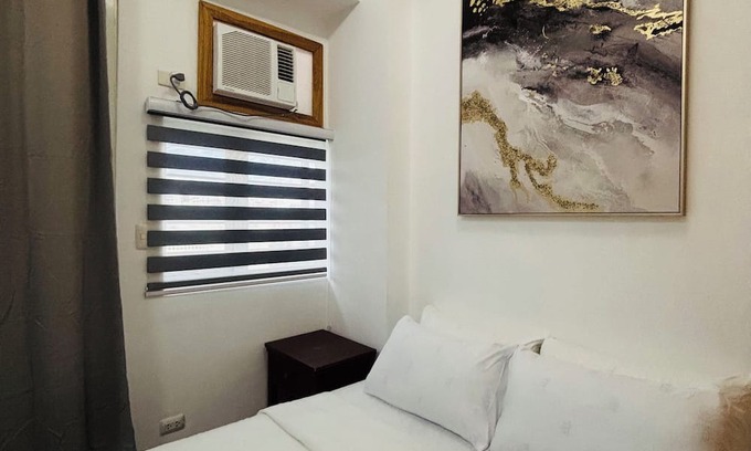 Iloilo Condo | Serene Getaway with Prime Emperador View