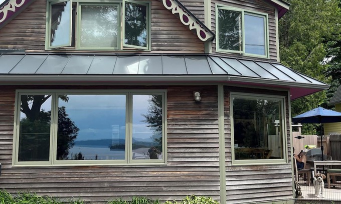 South Burlington House | Charming 3-bedroom house on Lake Champlain AC/Heat/Fireplace/Hot Tub/Theatre