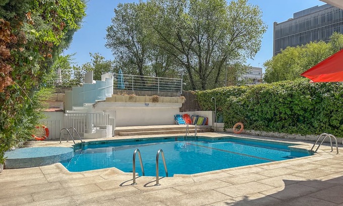 Nueva Espana Apartment | Cozy apartment with pool and garage