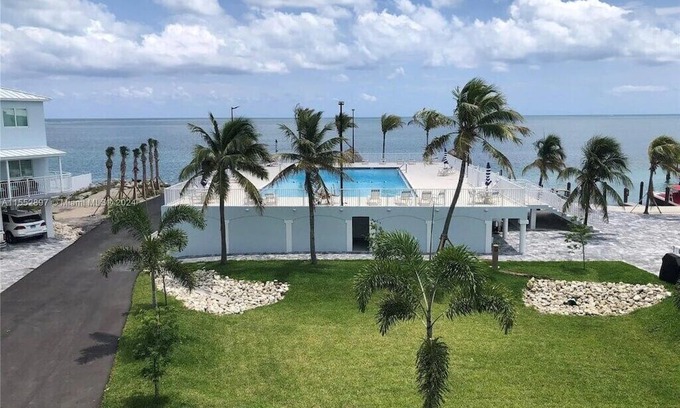Marathon Apartment | Modern, Oceanfront Views Apartment in Marathon with a pool and a marina