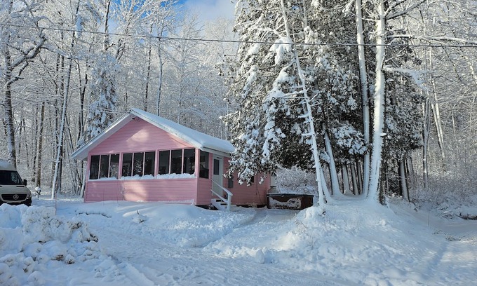 Brighton House | Lakefront vintage pink house. Hot tub