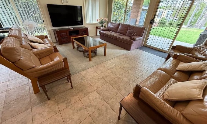 Kirwans Bridge House | Waterfront 4 Bedroom Home with Rumpus Room