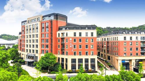 Xihu Hotel | Nine Rooms Serviced Apartment Hotel